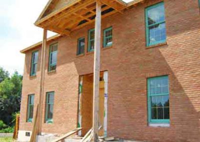 Brick Facade - Masonry - two story 2x4 holding up porch-lots of windows