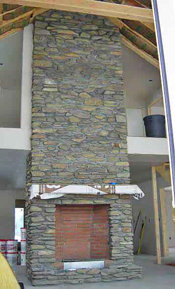Rumford Fireplace with Fieldstone to the top of the 2nd floor still under construction